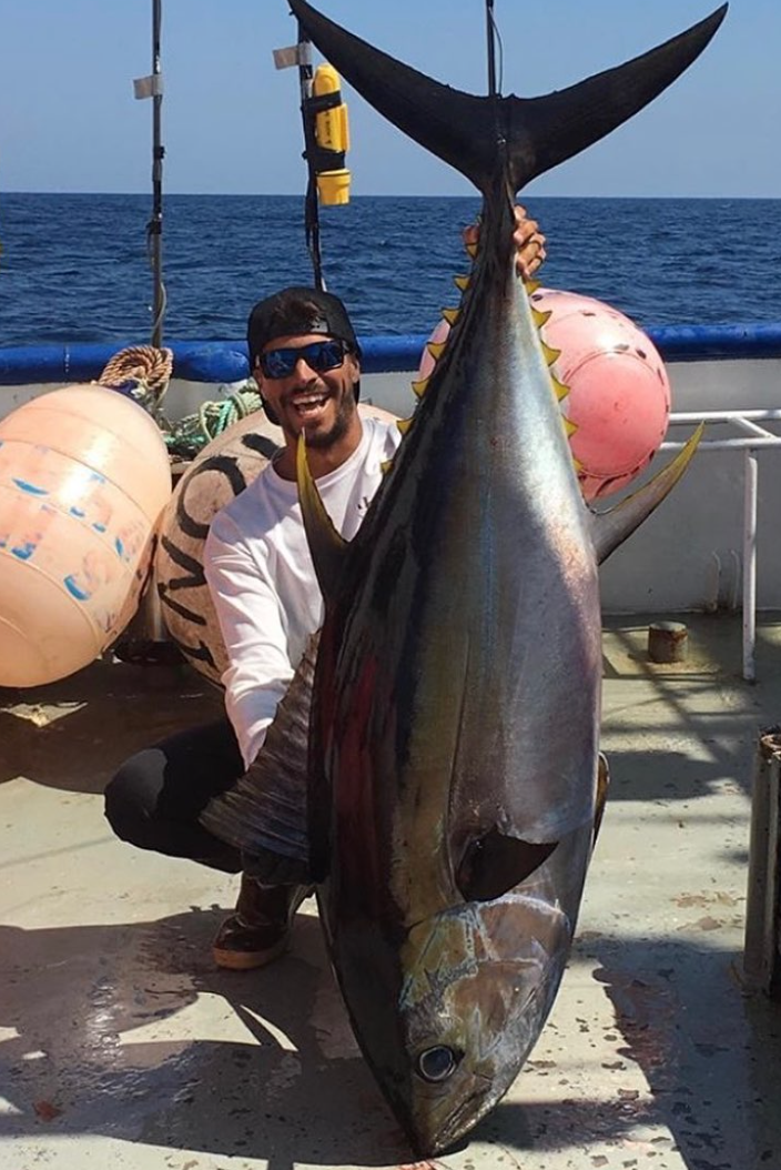 Viking Village fisherman shows his bigeye tuna catch