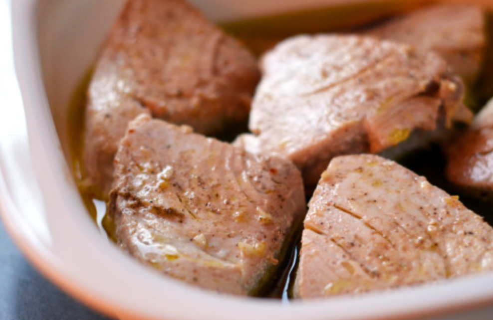 Tuna braised in olive oil