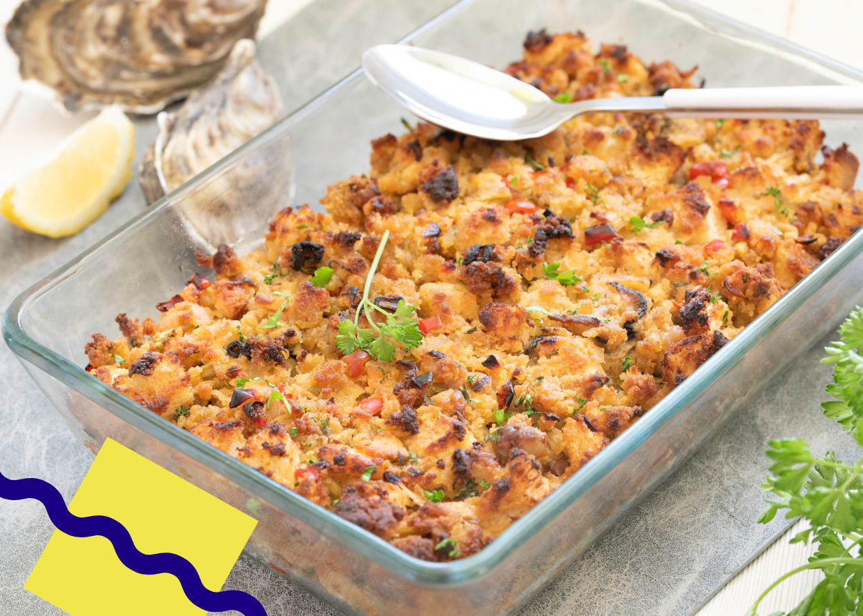 Oyster stuffing in a glass baking dish. Stock photo