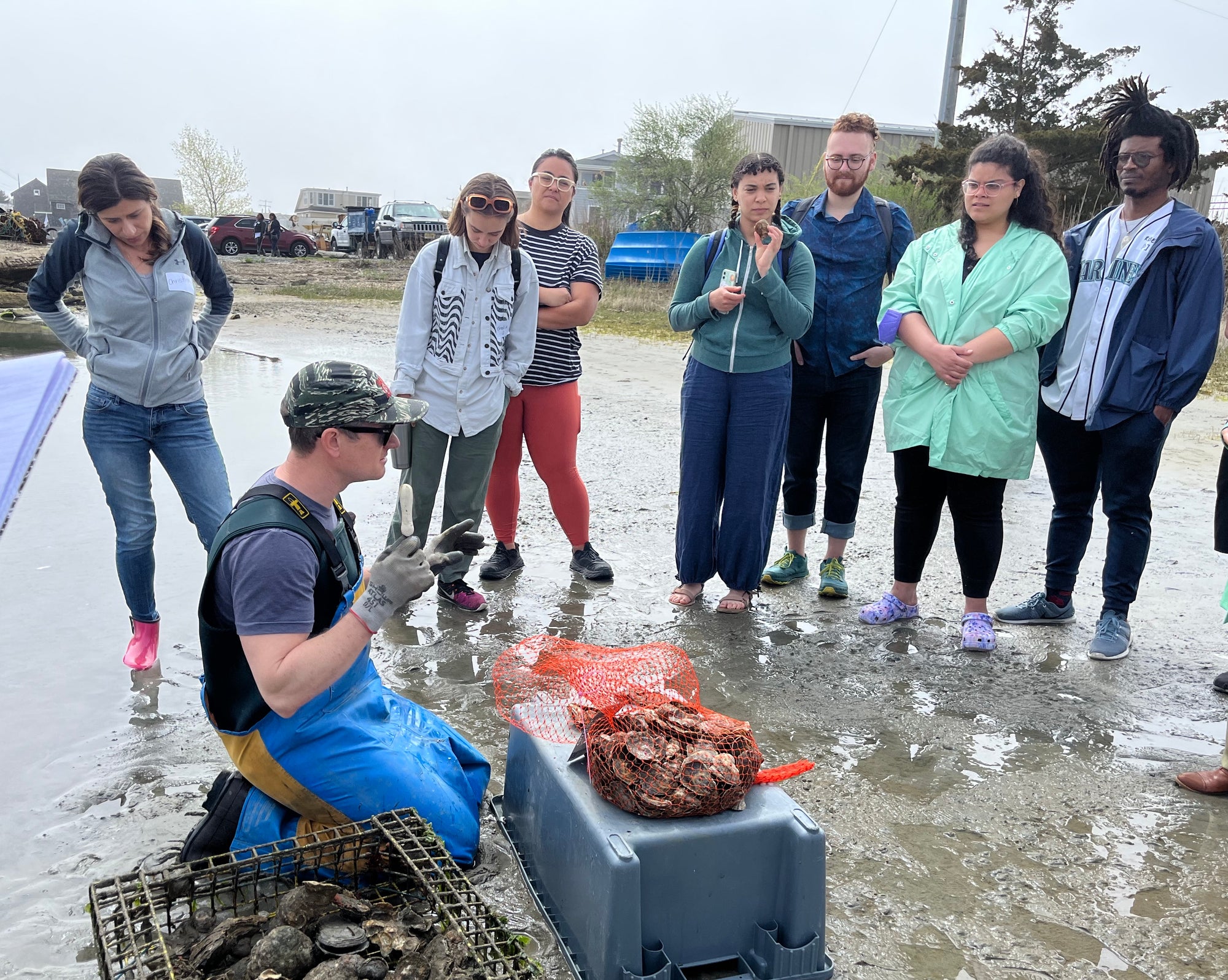 Fishadelphia dock trip participants learn about oyster farming from the Barnegat Oyster Collective